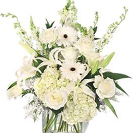 White floral arrangement in a clear glass vase