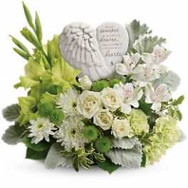 White and green sympathy arrangement with a memorial stone