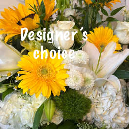 Bouquet of yellow gerbera daisies and white lilies with white blooms