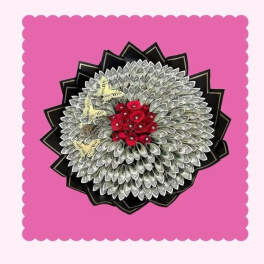 Decorative money bouquet with red roses on a pink background
