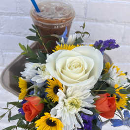 Bouquet with white and orange roses, yellow daisies, and purple filler flowers