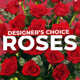 Red roses with greenery and a "Designer’s Choice Roses" label