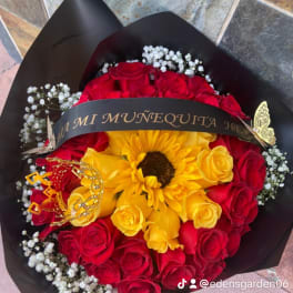Bouquet of red and yellow roses with a sunflower and black wrap