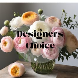 Bouquet of pastel ranunculus in a glass vase