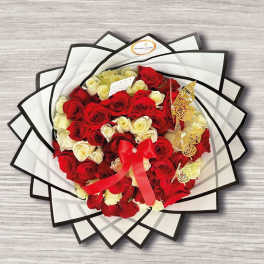Bouquet of red and white roses wrapped in black-edged paper