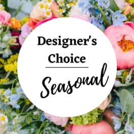 Designer’s Choice Seasonal floral arrangement with pastel blooms