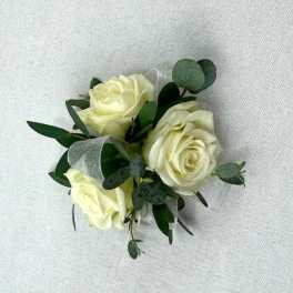 Small bouquet of cream roses with greenery and ribbon
