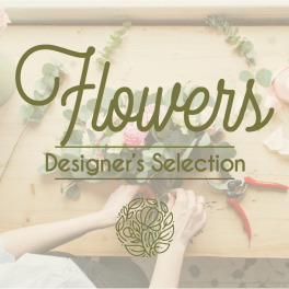 Floral design workspace with a bouquet and the words "Flowers Designer's Selection"
