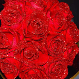Bouquet of red roses with glitter accents
