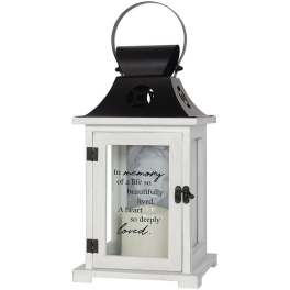 White memorial lantern with black metal top and remembrance verse on the glass door.