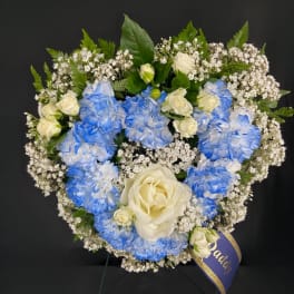 Blue and white floral wreath with roses and baby's breath
