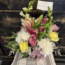 Pink and white mixed bouquet with lilies, roses, and carnations