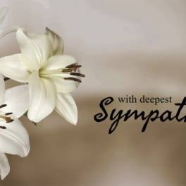 White lilies beside the words "with deepest Sympathy"