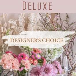 Designer’s choice deluxe floral arrangement with pink and white blooms