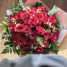 Two Dozen Roses Hand Tied