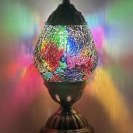 Colorful mosaic table lamp with a dark metal base