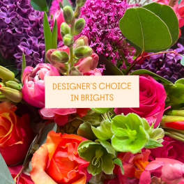 Bright mixed bouquet with pink, purple, orange, and green blooms