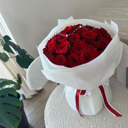 Red Bouquet With White Wrapping