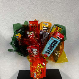 Bouquet of assorted candy bars wrapped in colorful cellophane