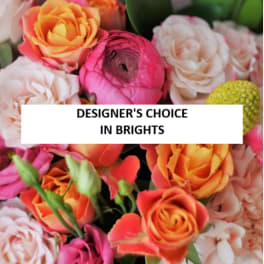Bright mixed bouquet with orange, pink, and pale roses