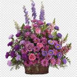 Basket arrangement of purple and pink flowers