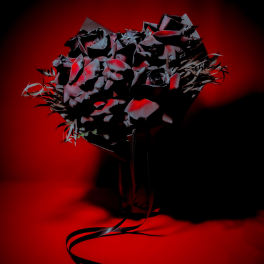 Dark bouquet with black and red flowers tied with a black ribbon