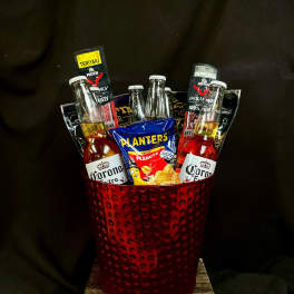Gift bucket with beer bottles, jerky packs, and peanuts