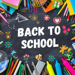 Back to school chalkboard graphic with colorful stationery around the edges