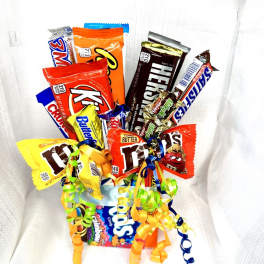 Candy bouquet with assorted chocolate bars and rainbow curling ribbons