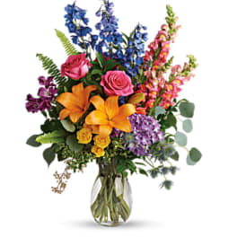 Colorful mixed bouquet in a clear glass vase