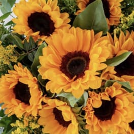 Bouquet of orange sunflowers with yellow filler flowers