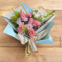Premium Pink Roses bouquet (wrapped with pastel blue floral paper)