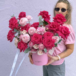 Large pink and hot pink rose bouquet in a pink hat box
