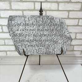 Decorative memorial plaque on a metal stand with a Bible verse