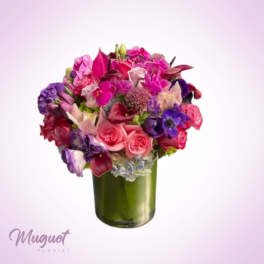 Cascading Dreams: Purple, Pink, and Blue Floral Arrangement