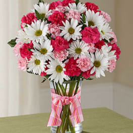 Vase of Pink Carnations, Daises And Mini Roses In A Vase