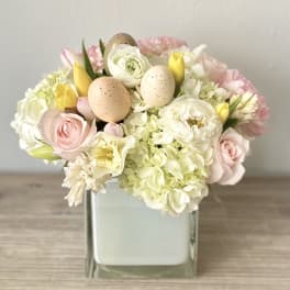 Ester flower arrangement with eggs - white vase