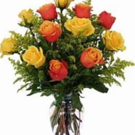 Long Stem Orange and yellow roses arranged in a vase
