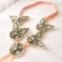 Money lei with delicate dollar flowers