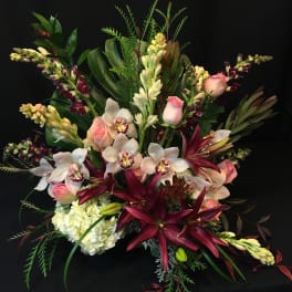 Tropical Display of Roses, Lilies and Orchids