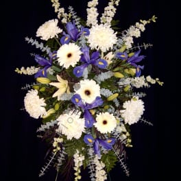 Designer's CHOICE of Flowers in a Medium Standing Spray - Color will vary