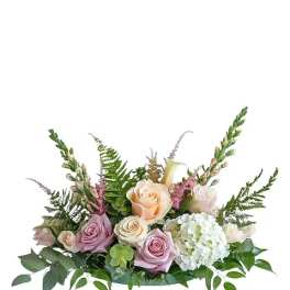 Pastel rose and hydrangea arrangement with fern accents