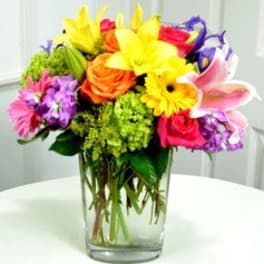 Colorful mixed bouquet in a clear glass vase