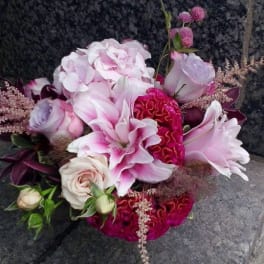 Pink and white bouquet with roses, lilies, and hydrangea