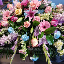 Large mixed bouquet with pink, purple, blue, and white flowers