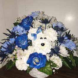 Blue and white flower basket arranged as a dog face