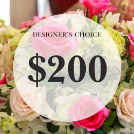 Mixed pink and white flower bouquet with a $200 designer's choice label