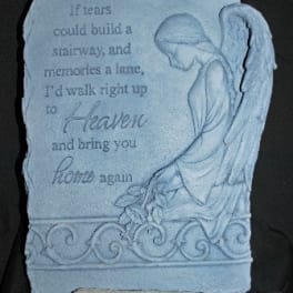 Memorial plaque with an angel and engraved sympathy message