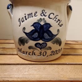 Ceramic pot with blue bird design and the names Jaime & Chris