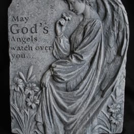 Gray memorial plaque with an angel and flowers
